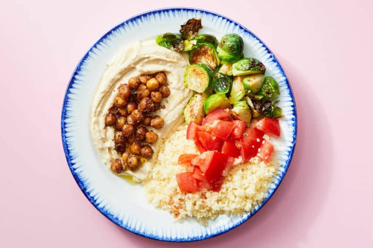 Mediterranean spiced chickpea mezze bowl with homemade hummus & brussels sprouts